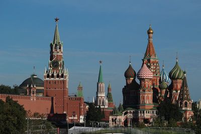 View of buildings in city against sky