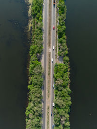 High angle view of road amidst trees in forest