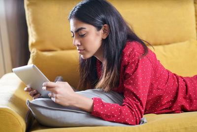 Young woman using mobile phone