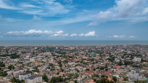 Aerial view of townscape against sky