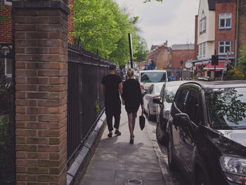 Woman walking on city street