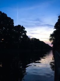 Scenic view of lake at sunset