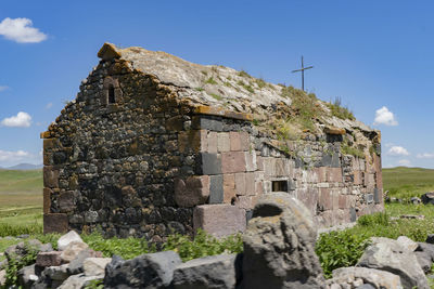 Low angle view of old building against sky