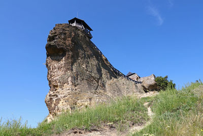 Low angle view of boldogko castle against clear sky