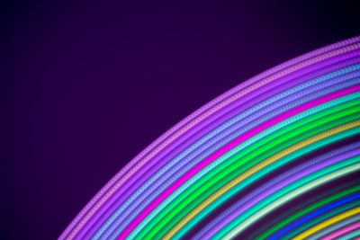 Close-up of rainbow over black background