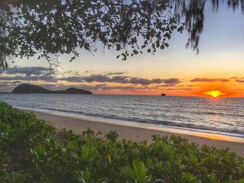 Scenic view of sea against sky during sunset