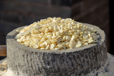 Close-up of nuts in container