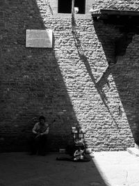 Shadow of woman on wall