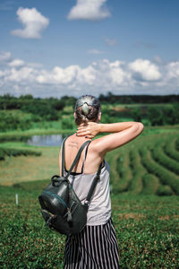 Woman standing on field