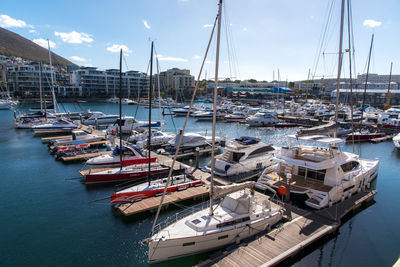 Boats moored at harbor