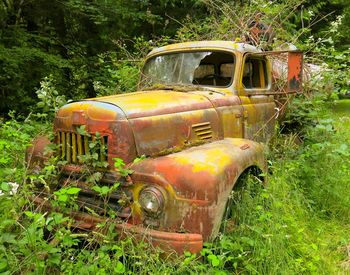 Abandoned house on field