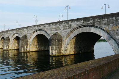 Bridge over river against sky