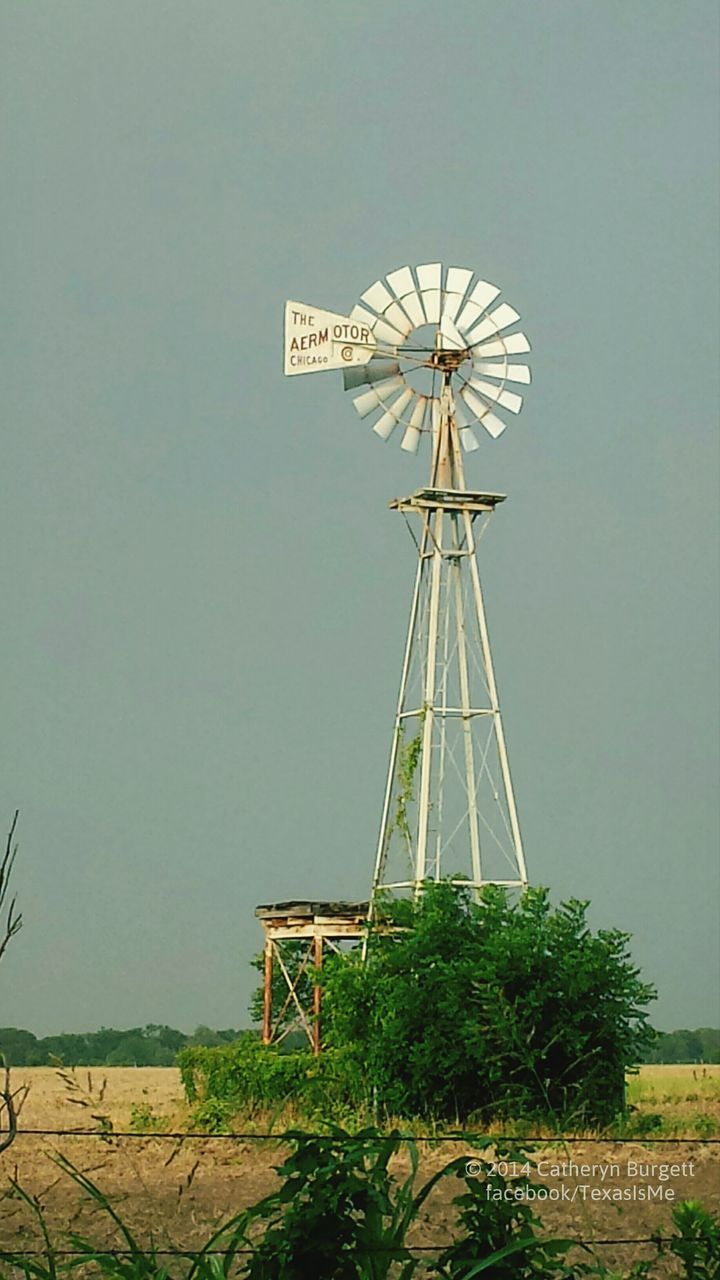 wind power, windmill, alternative energy, environmental conservation, renewable energy, wind turbine, fuel and power generation, traditional windmill, technology, field, rural scene, low angle view, clear sky, landscape, sky, day, copy space, outdoors, no people, built structure