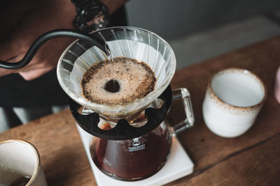 Close-up of coffee cup on table