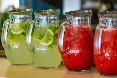 Close-up of drink in glass jar on table