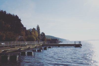 Pier over sea against sky