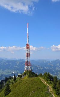 Tower on mountain against sky