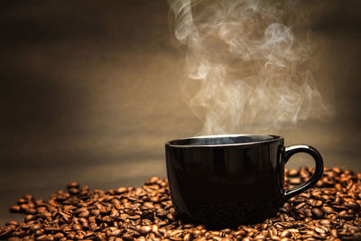 Close-up of coffee cup on table