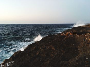 Scenic view of sea against clear sky