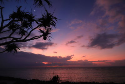 Scenic view of sea against sky at sunset