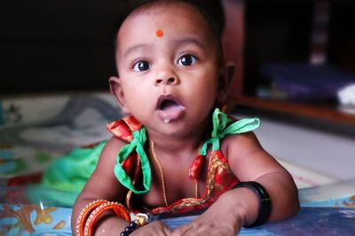 Portrait of cute baby at home