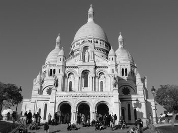 Tourists in front of historical building