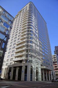 Low angle view of modern building against clear sky