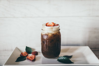 Close-up of dessert in glass on table