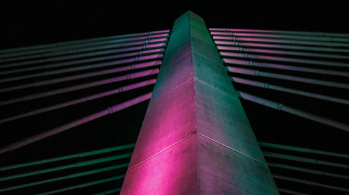 Low angle view of illuminated lights at night