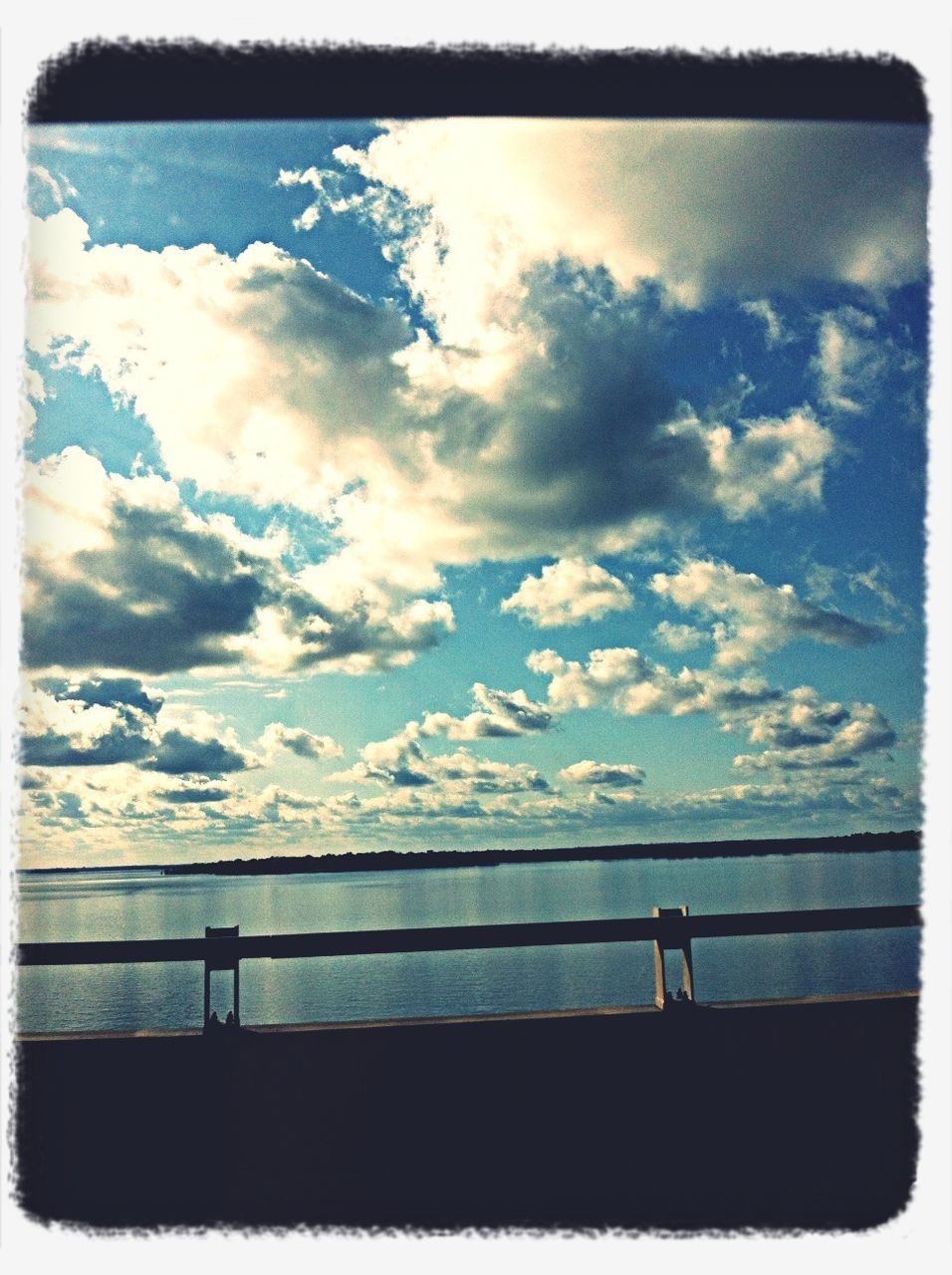 transfer print, sky, water, auto post production filter, sea, cloud - sky, tranquil scene, tranquility, scenics, silhouette, beauty in nature, nature, cloud, horizon over water, cloudy, railing, idyllic, outdoors, men