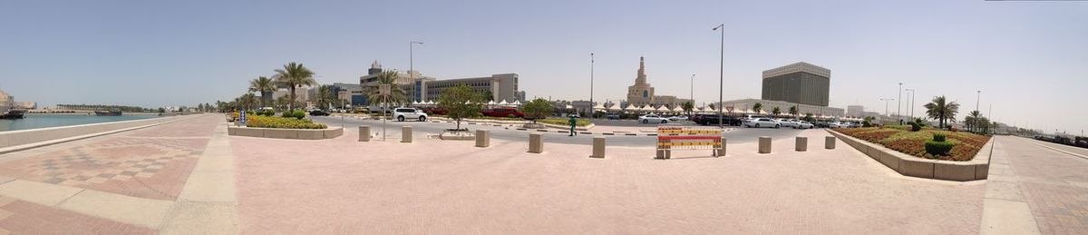 View of swimming pool against buildings in city