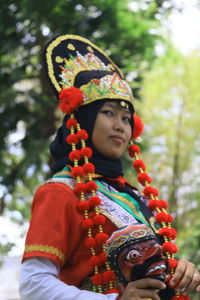 Low angle view of woman wearing costume