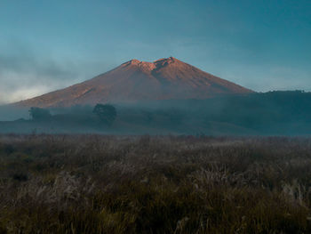 Scenic view of volcanic landscape against sky