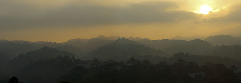 Scenic view of mountains against sky during sunset