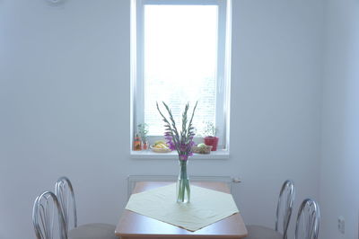 Close-up of vase on table at home