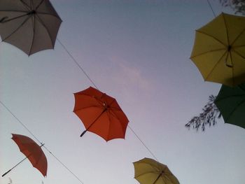 Low angle view of umbrella against sky