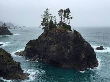 High angle view of stack rock in sea