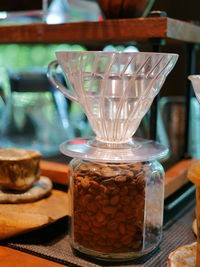 Close-up of drink in glass jar on table