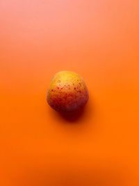 Ripe apricot, fresh fruit, orange apricot, fresh vitamins, orange background, summer fruit