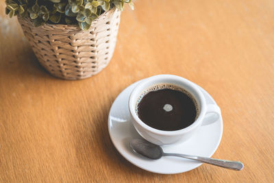 Close-up of coffee cup on table