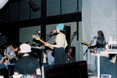 Group of people playing music at concert
