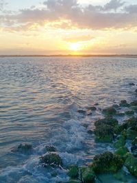 Scenic view of sea against dramatic sky