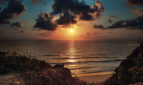 Scenic view of sea against sky during sunset