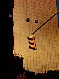 Close-up of lamp hanging in row