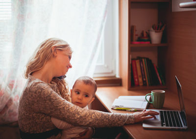 Mother and son at home