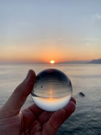 Sunset reflected in a crystal ball