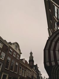 Low angle view of buildings against clear sky