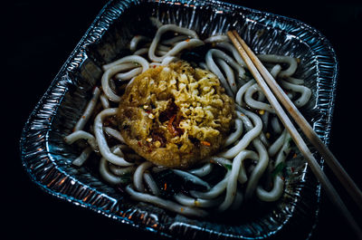 Close-up of noodles served in plate on table