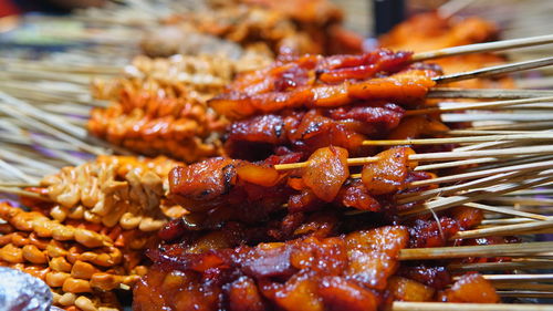 Close-up of meat on barbecue grill