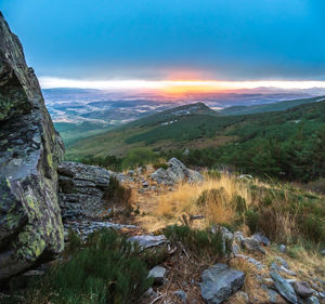 Scenic view of landscape against sky during sunset